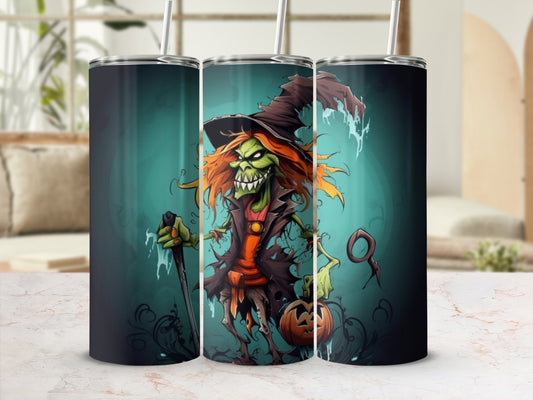 Tumbler with a cartoon witch holding a staff and pumpkin on a teal background.