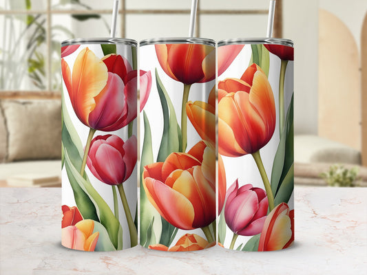 Three tumblers with vibrant orange and pink tulip floral design.