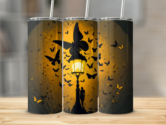 Three tumblers with a night scene design featuring a lamppost, silhouette, and many butterflies.
