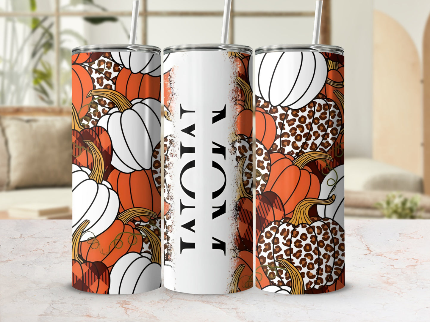 Tumbler with pumpkins, leopard print, and plaid patterns.