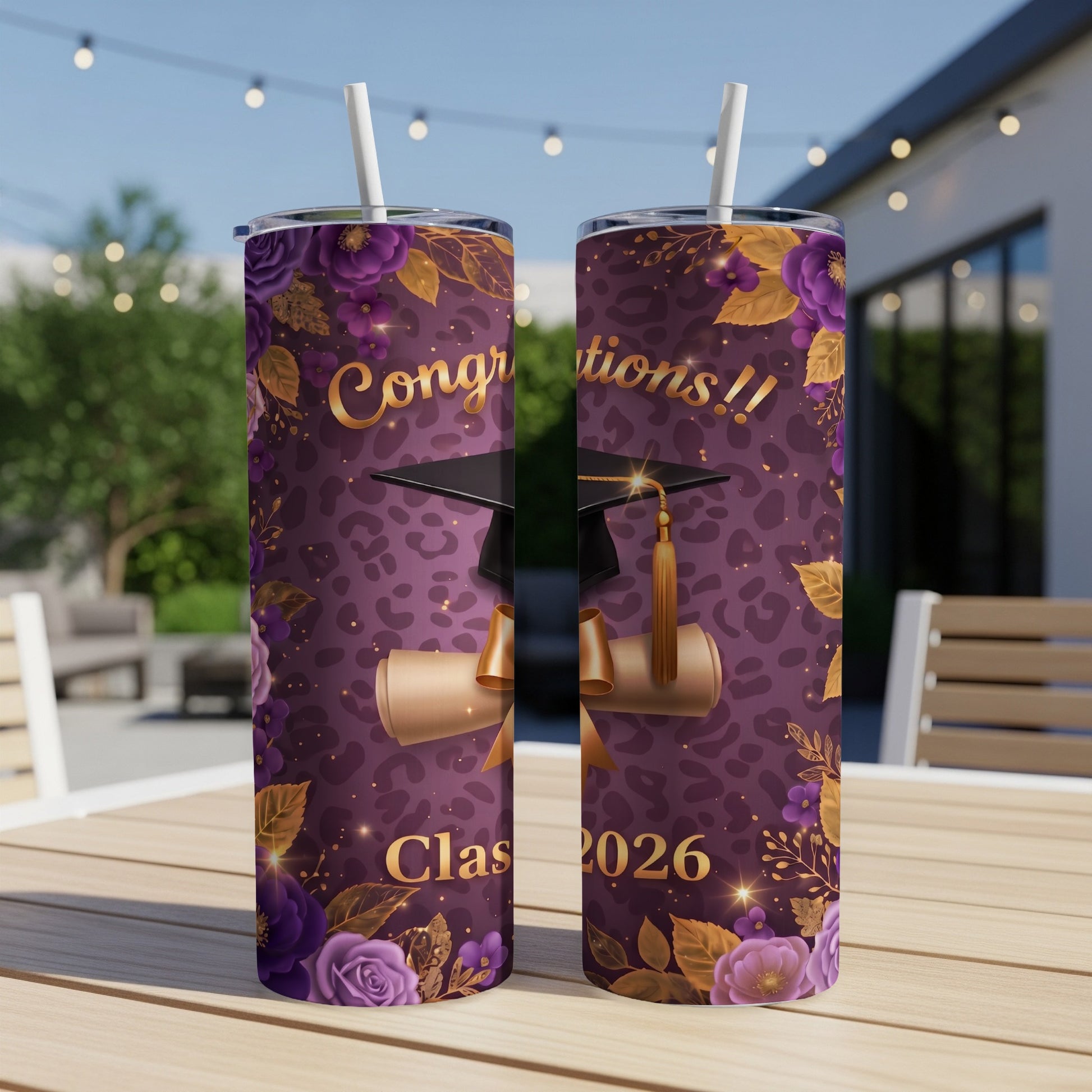 Purple tumbler with floral design, graduation cap, and "Class 2026" text.