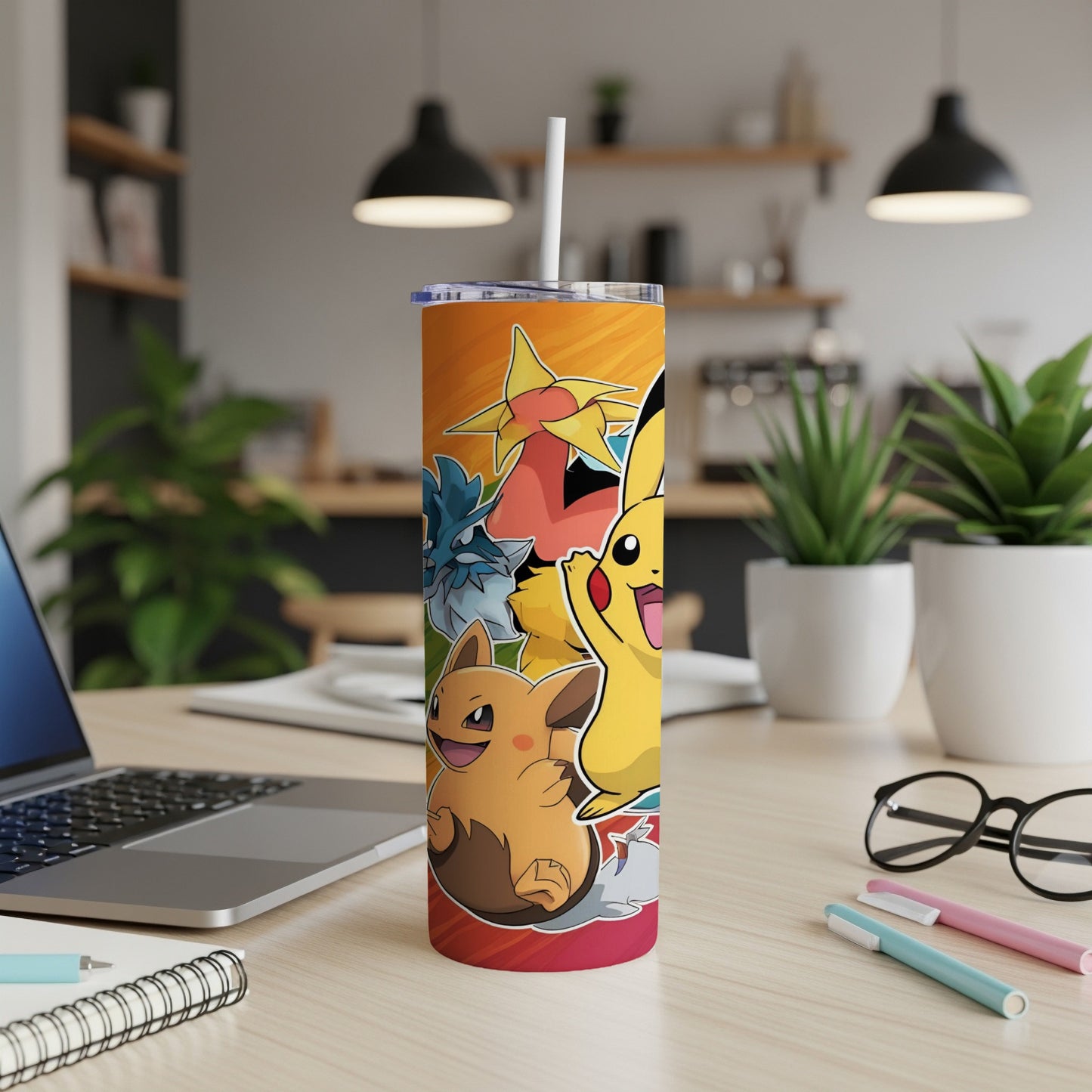 Tall tumbler featuring colorful cartoon Pokemon characters on an orange background.