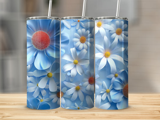 Three tumblers with blue and white daisy floral patterns.