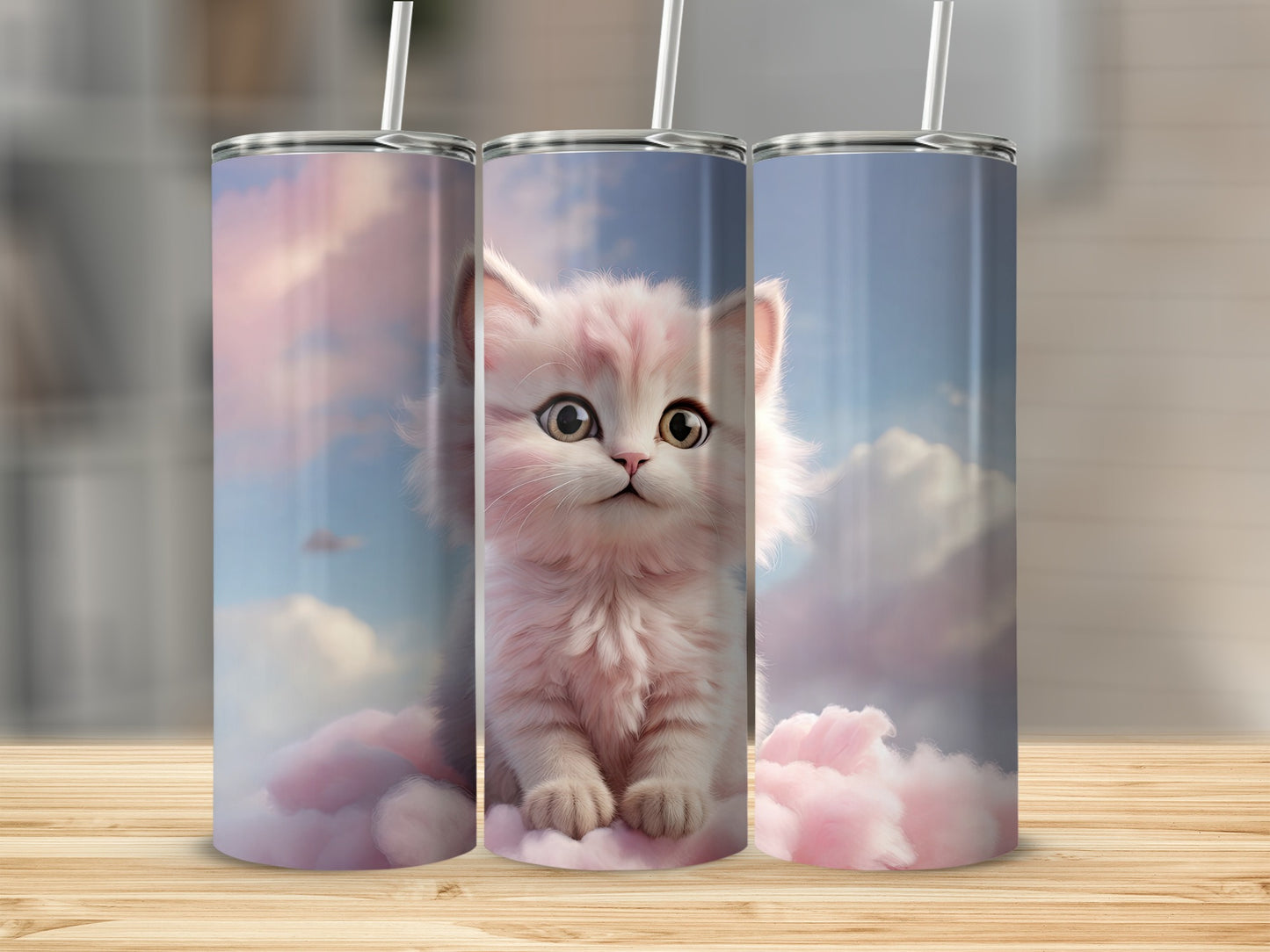 Pink kitten sitting on clouds with straws in a tumbler design.