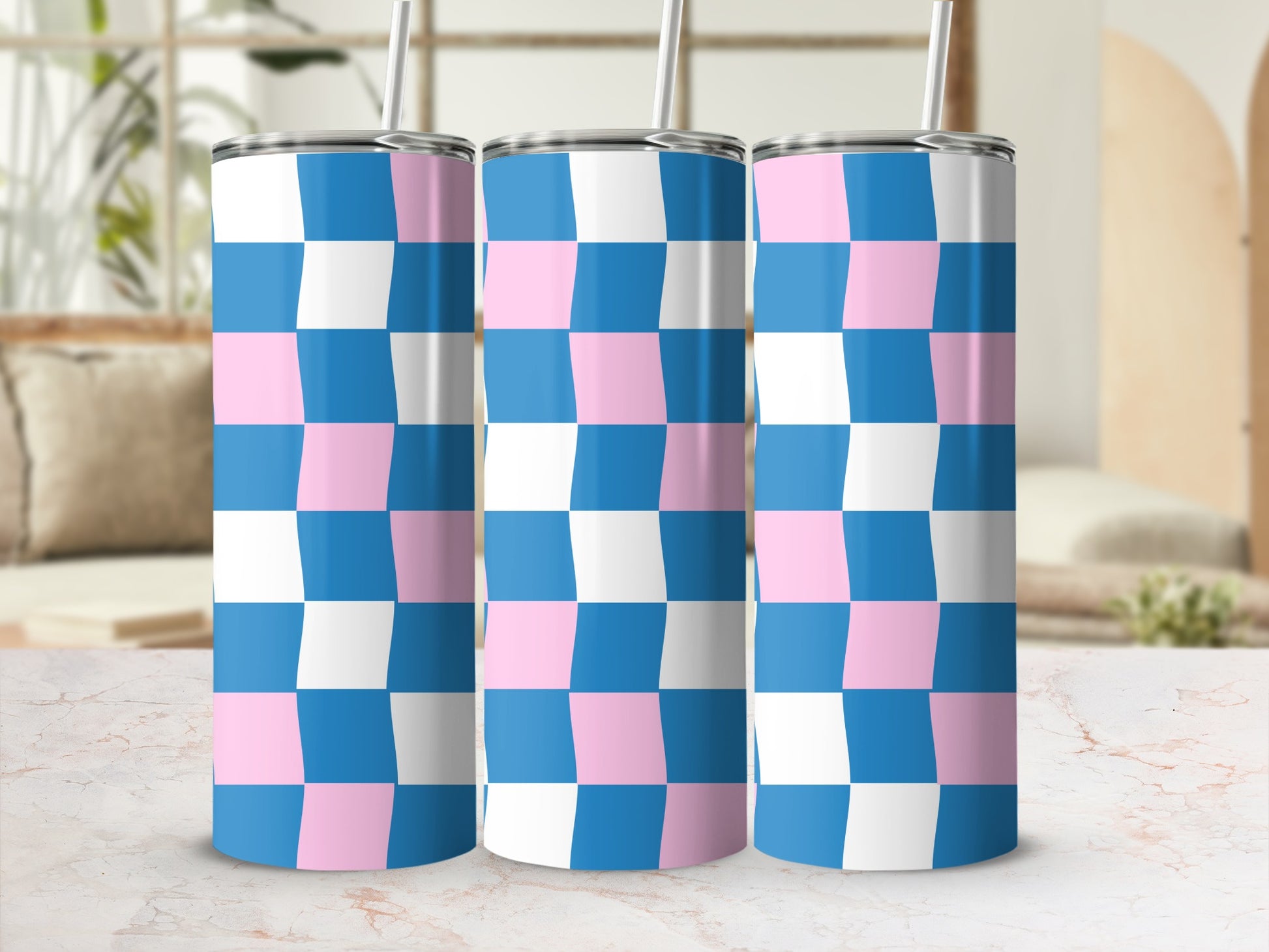 Three tumblers with a pink, blue, and white checkerboard pattern.