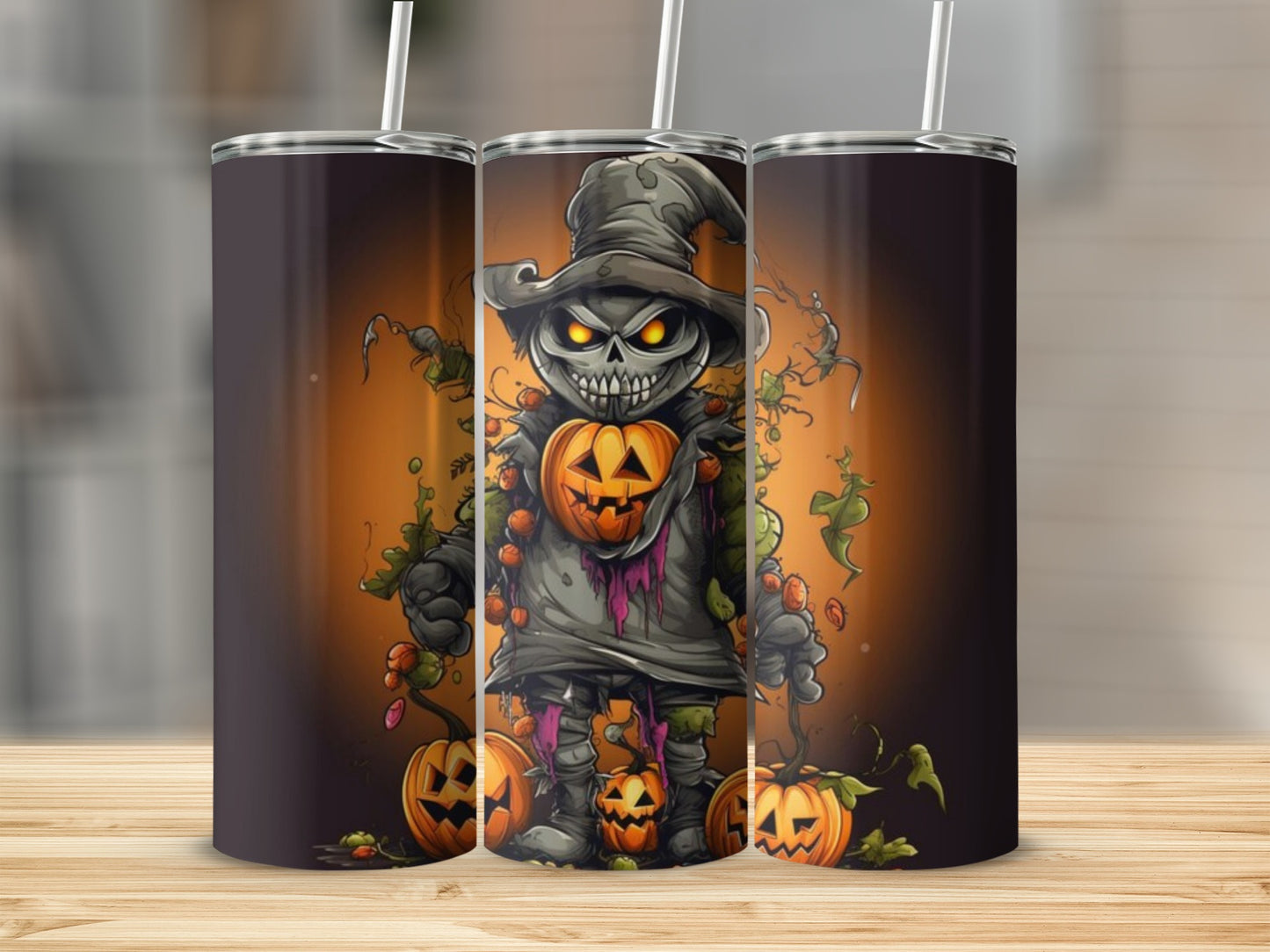 Three tumblers featuring a cartoon monster with a pumpkin head and spooky Halloween theme.