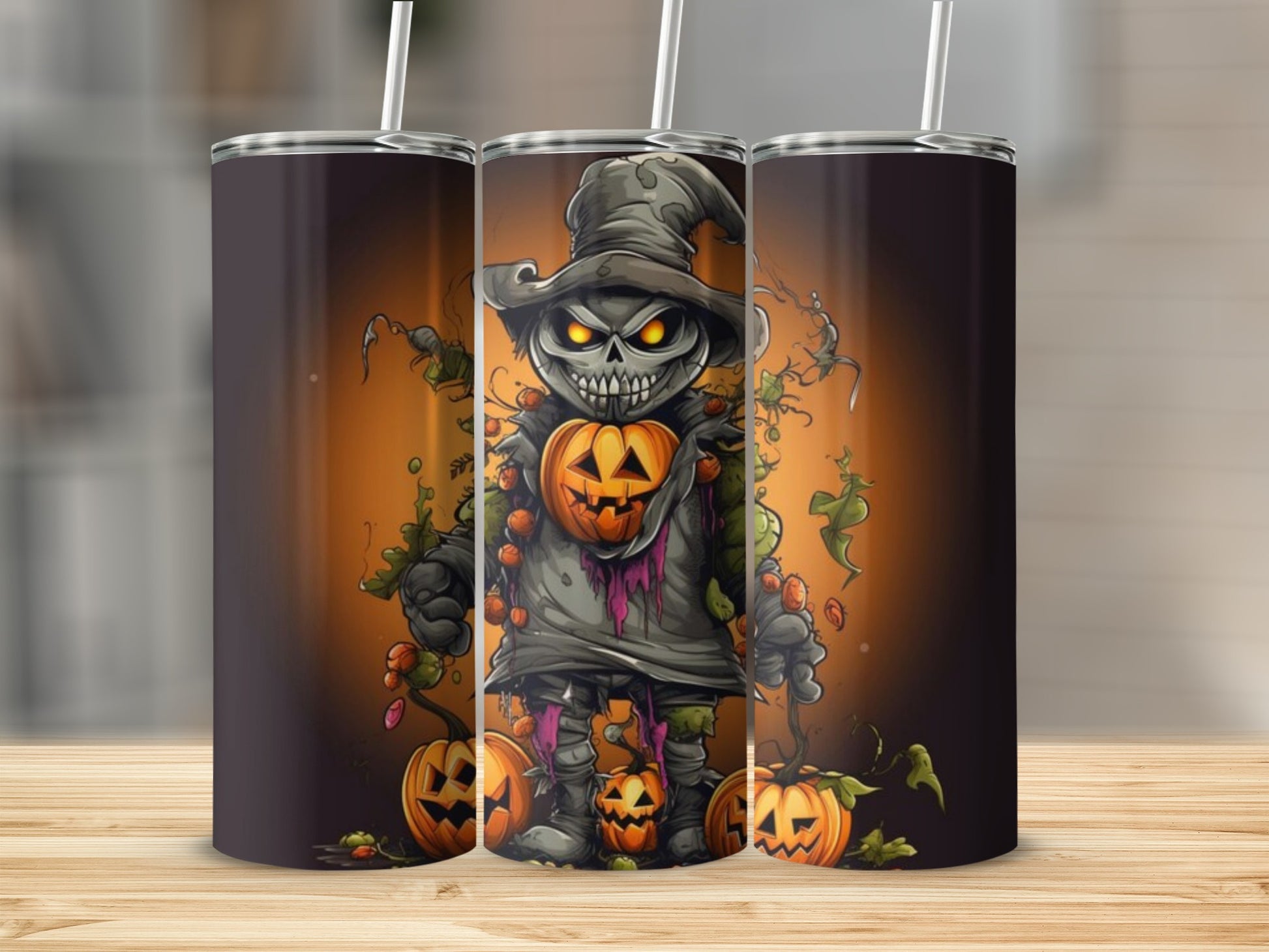 Three tumblers featuring a cartoon monster with a pumpkin head and spooky Halloween theme.
