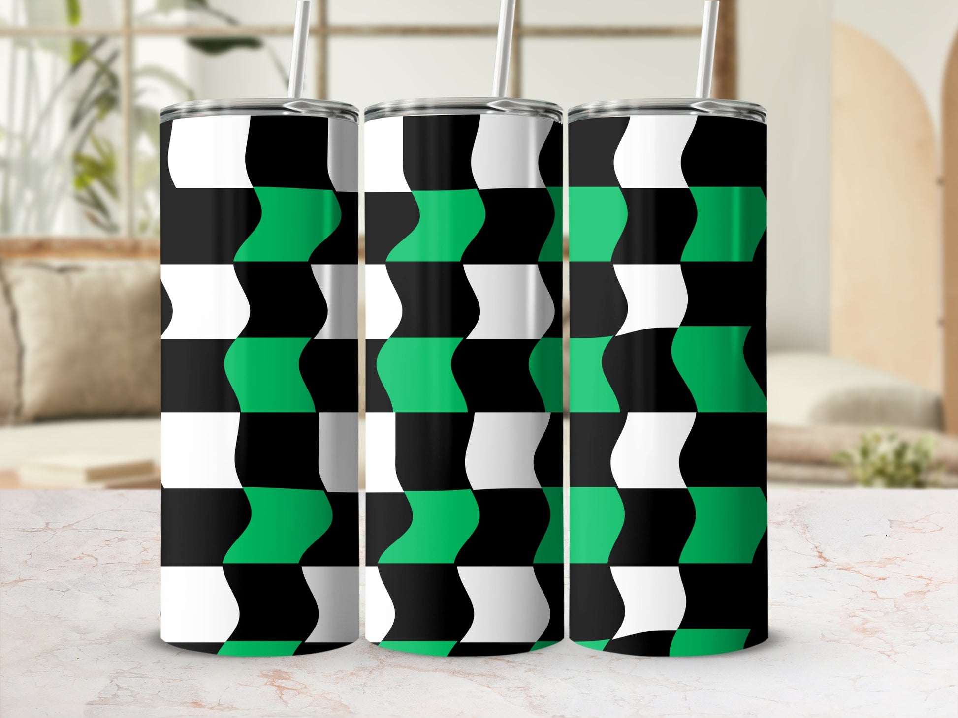 Three tumblers with black, white, and green geometric chevron pattern.