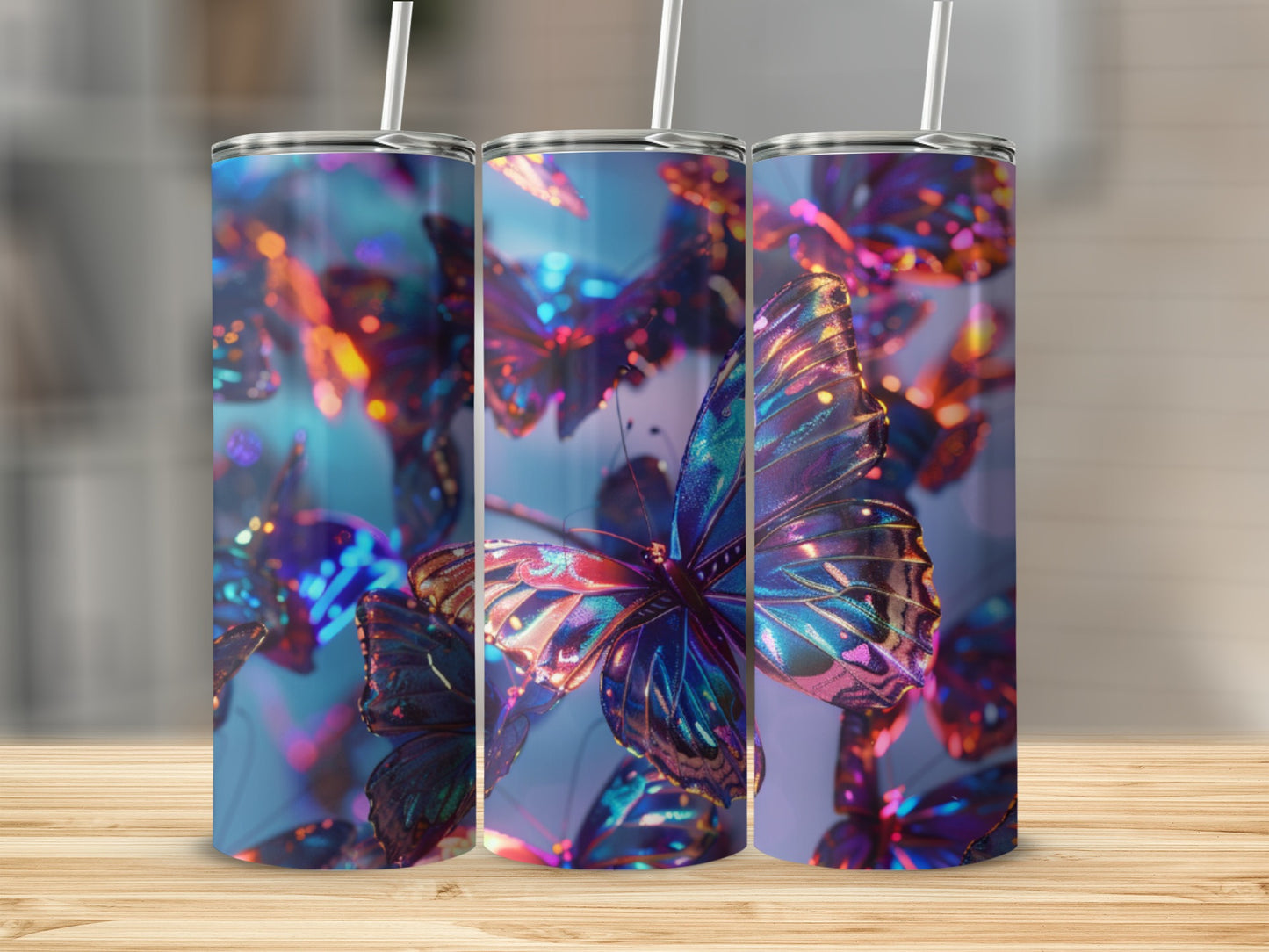 Three tumblers displaying iridescent butterflies against a bokeh background.