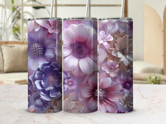 Three tumblers with floral designs in shades of purple and pink.
