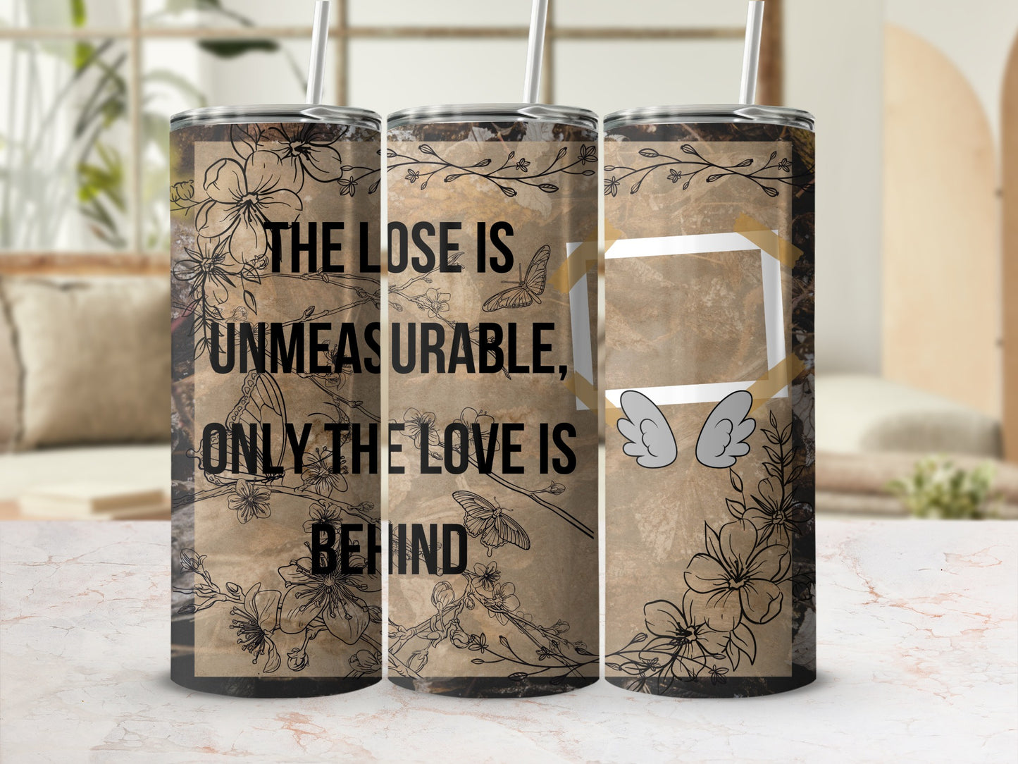 Tumbler with floral design and text "The lose is unmeasurable, only the love is behind."