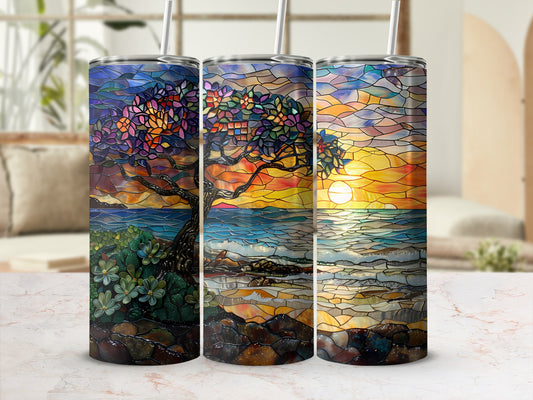 Triptych of stained glass art featuring a vibrant tree, ocean, and sunset.