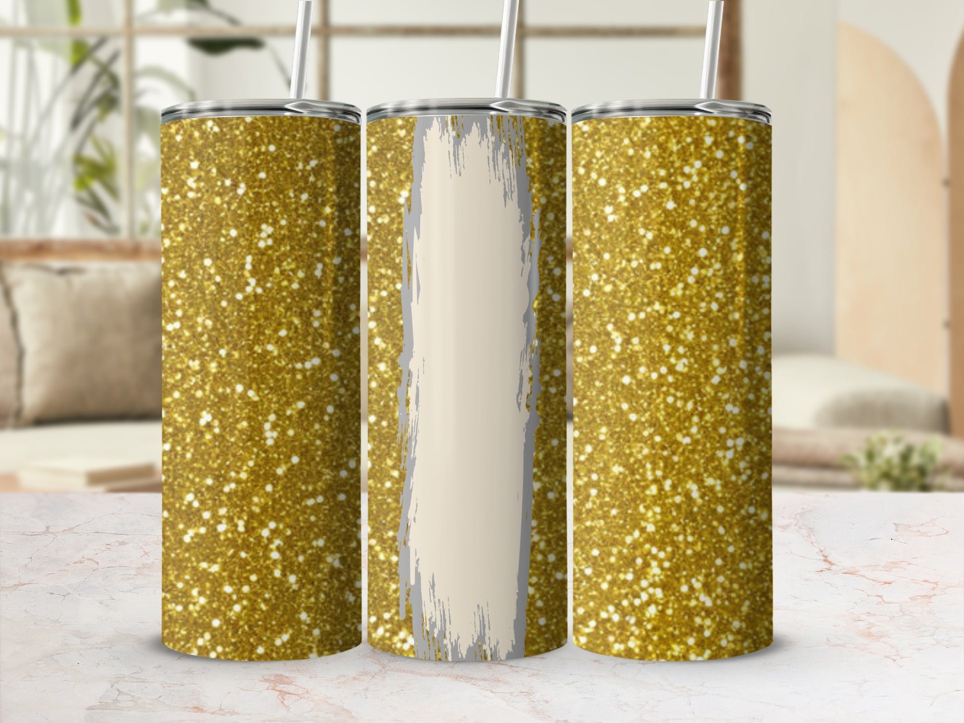 Three glitter tumblers with straw, one with a distressed cream panel.