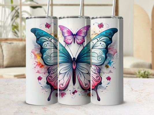 Three white tumblers with colorful butterfly designs and floral accents.