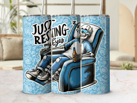 Skeleton resting in recliner with bottle, text "Just resting my eyes".