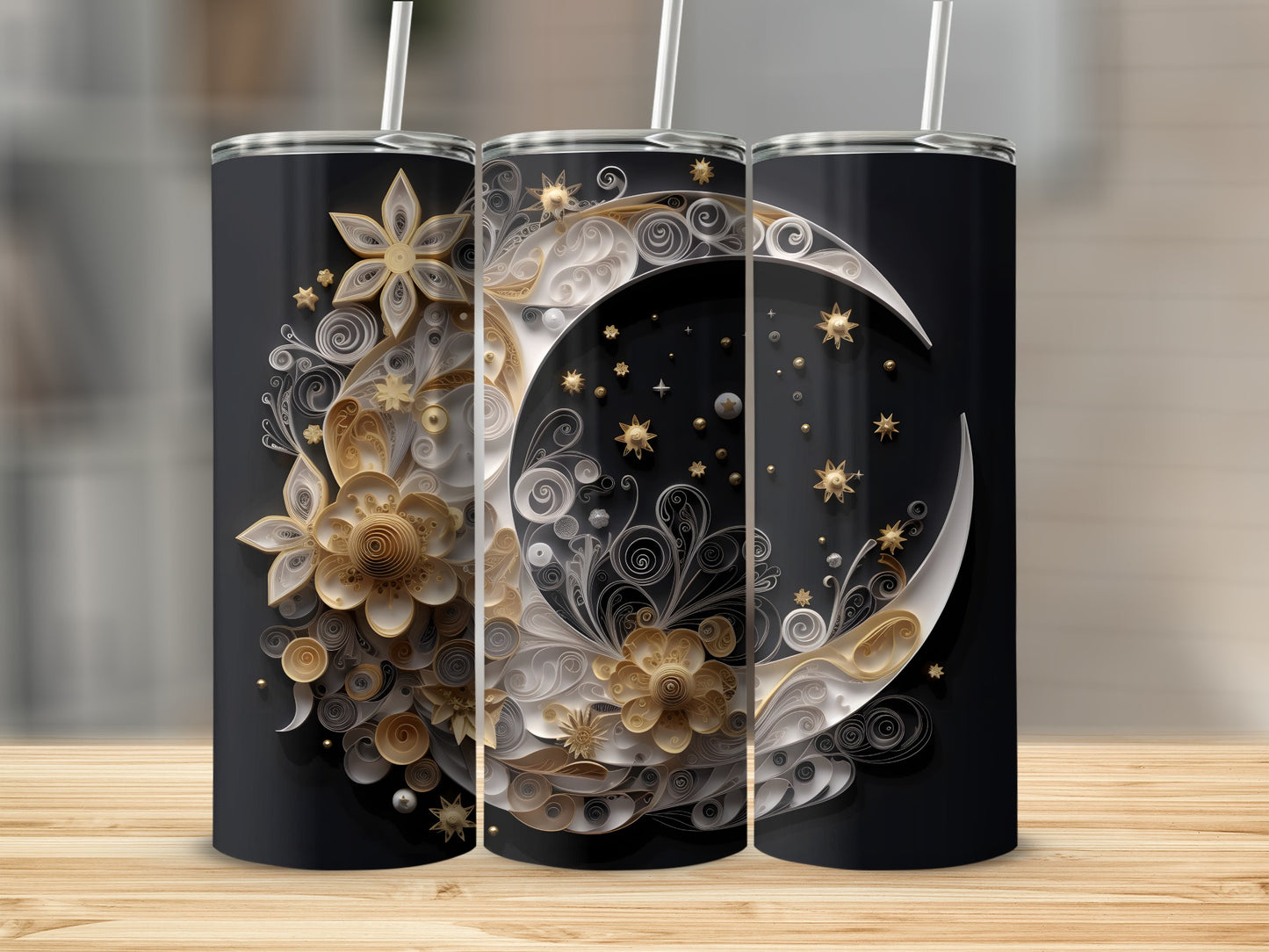 Three black tumblers with moon and floral filigree designs.