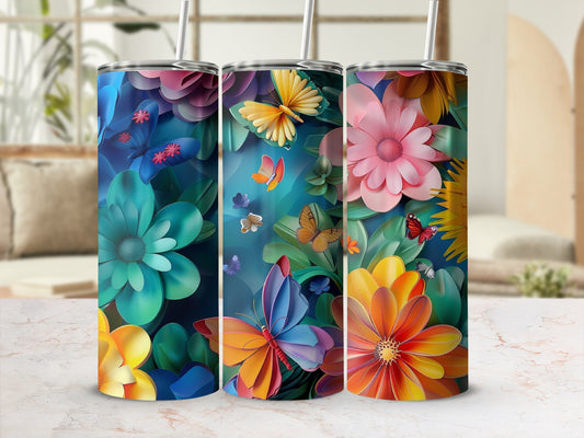 Floral and butterfly pattern on three tall tumblers with straws.