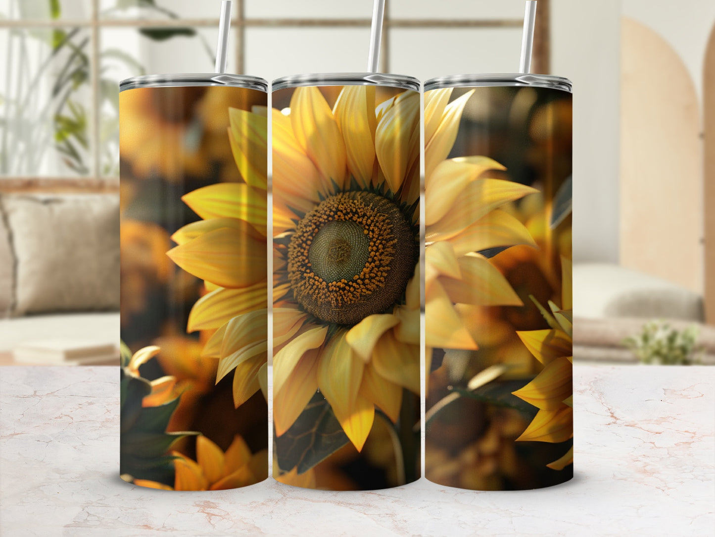 Sunflower pattern tumbler with straw, shown on a marble surface.