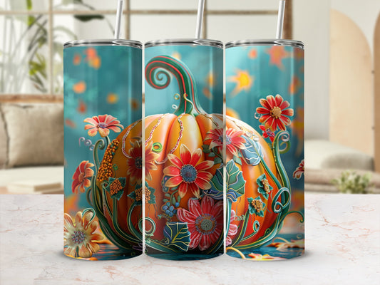 Floral pumpkin design on three matching tumblers with straws.