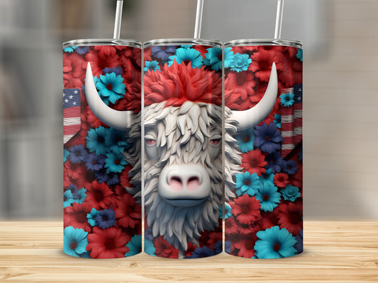 White Highland cow with red, white, and blue floral accents on a tumbler.