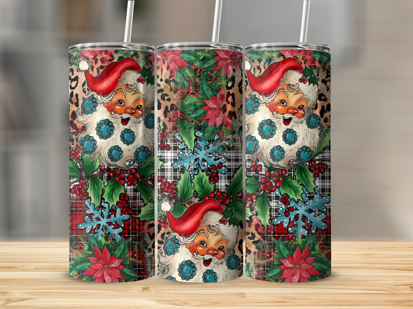 Three tumblers with Santa Claus design, snowflakes, poinsettias, and leopard print.