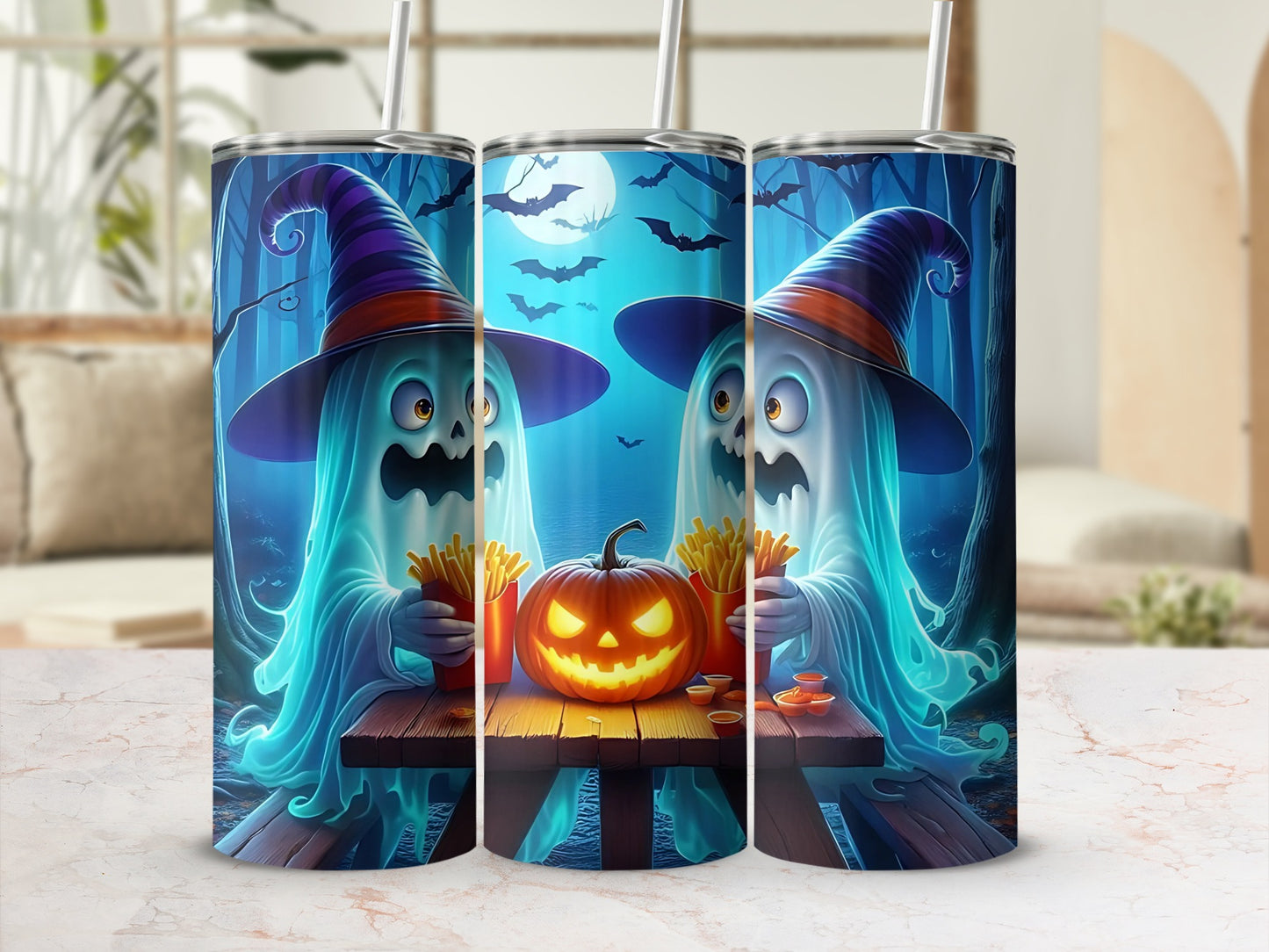 Three tumblers featuring ghosts in witch hats, a jack-o'-lantern, and french fries.