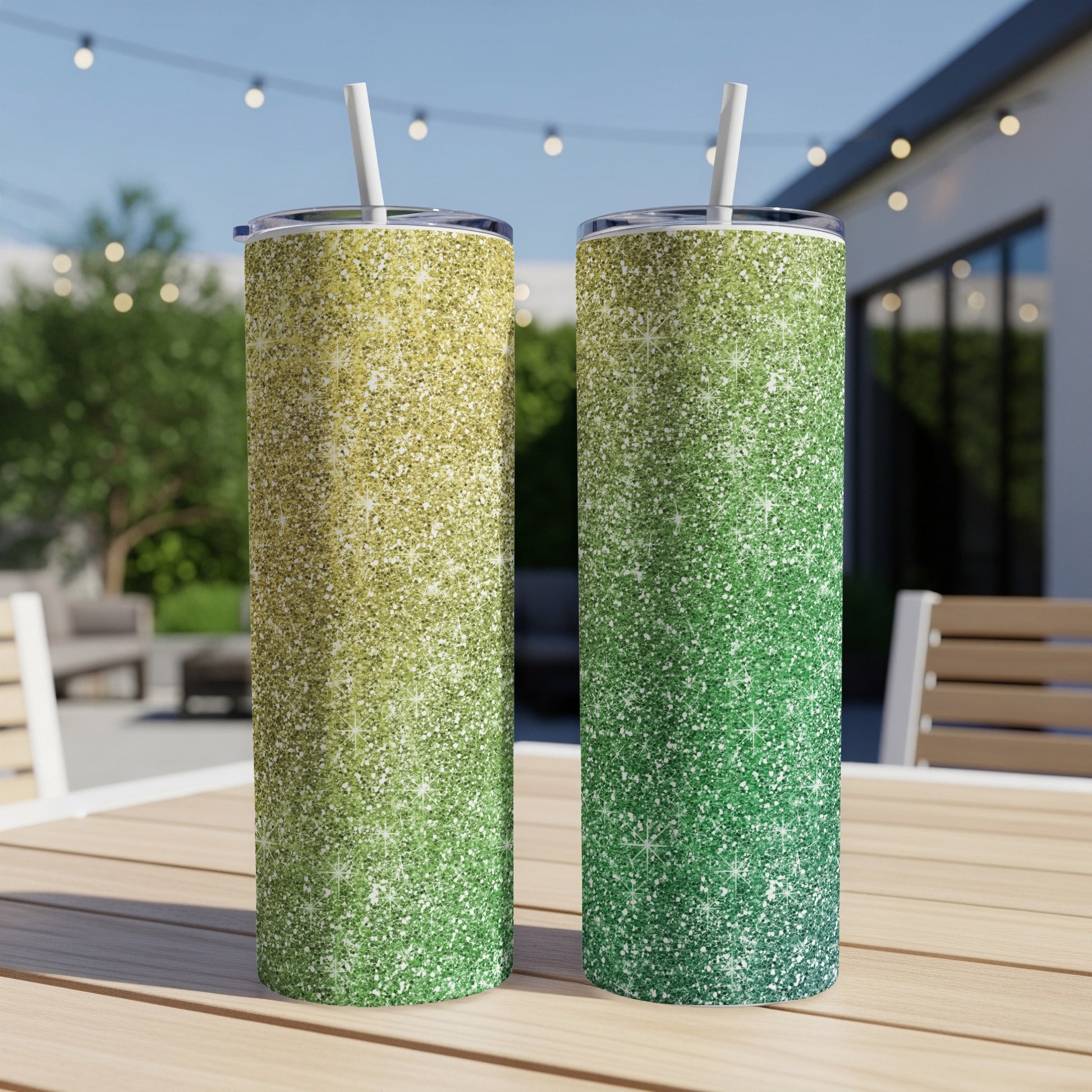 Two glitter tumblers, one yellow to green gradient, one green gradient.
