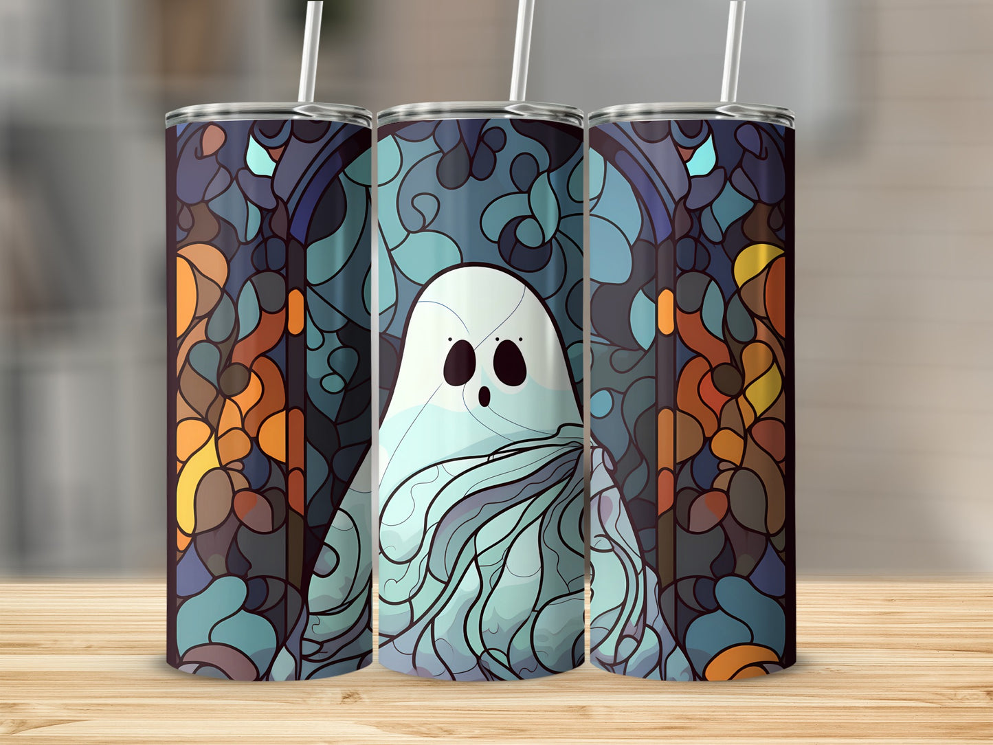 Three tumblers featuring a cartoon ghost in stained glass style.