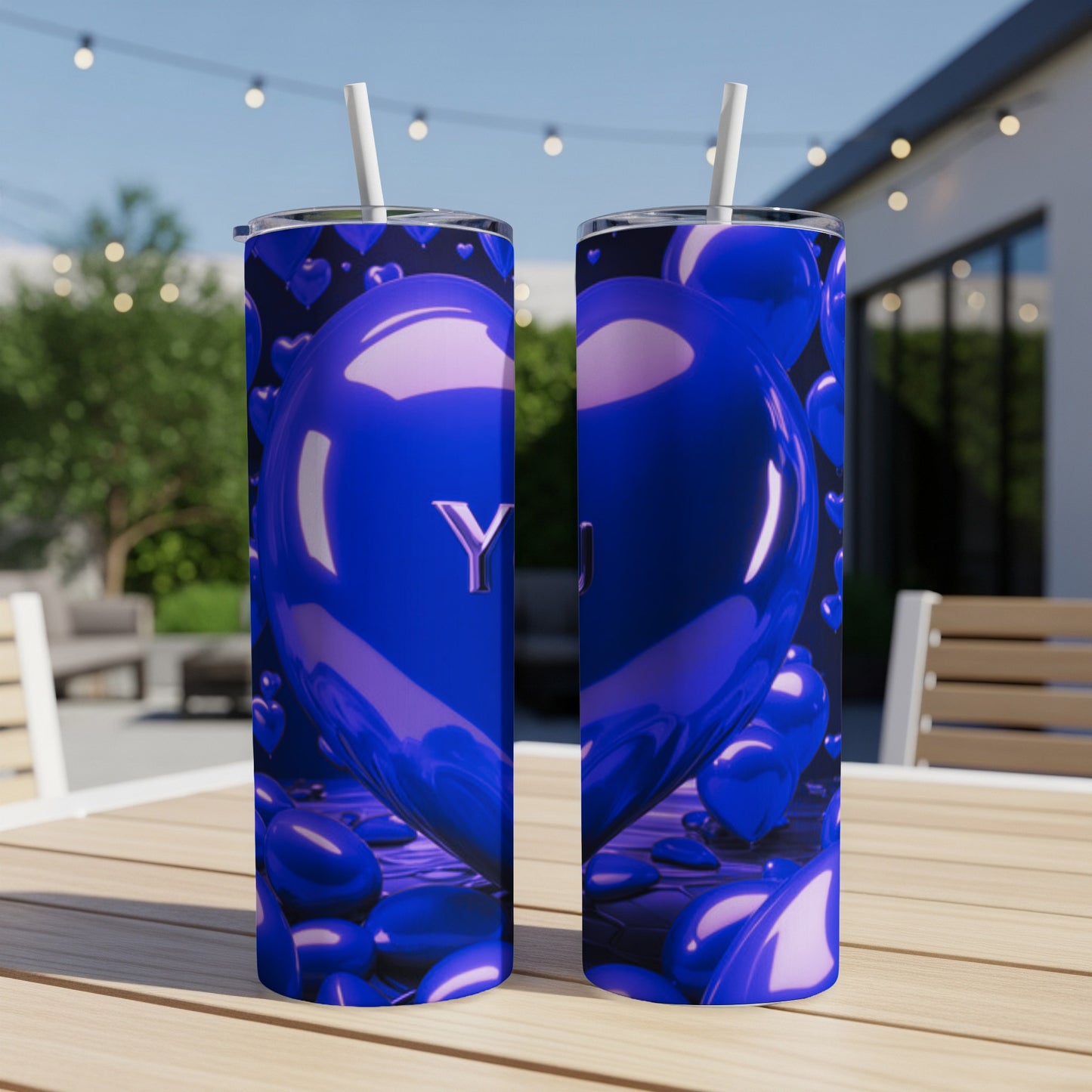 Blue heart-shaped tumbler with "YOU" and smaller blue hearts.