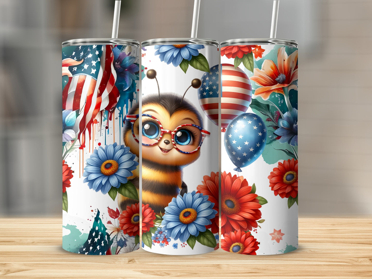 Three tumblers decorated with bees, US flags, and patriotic flowers.