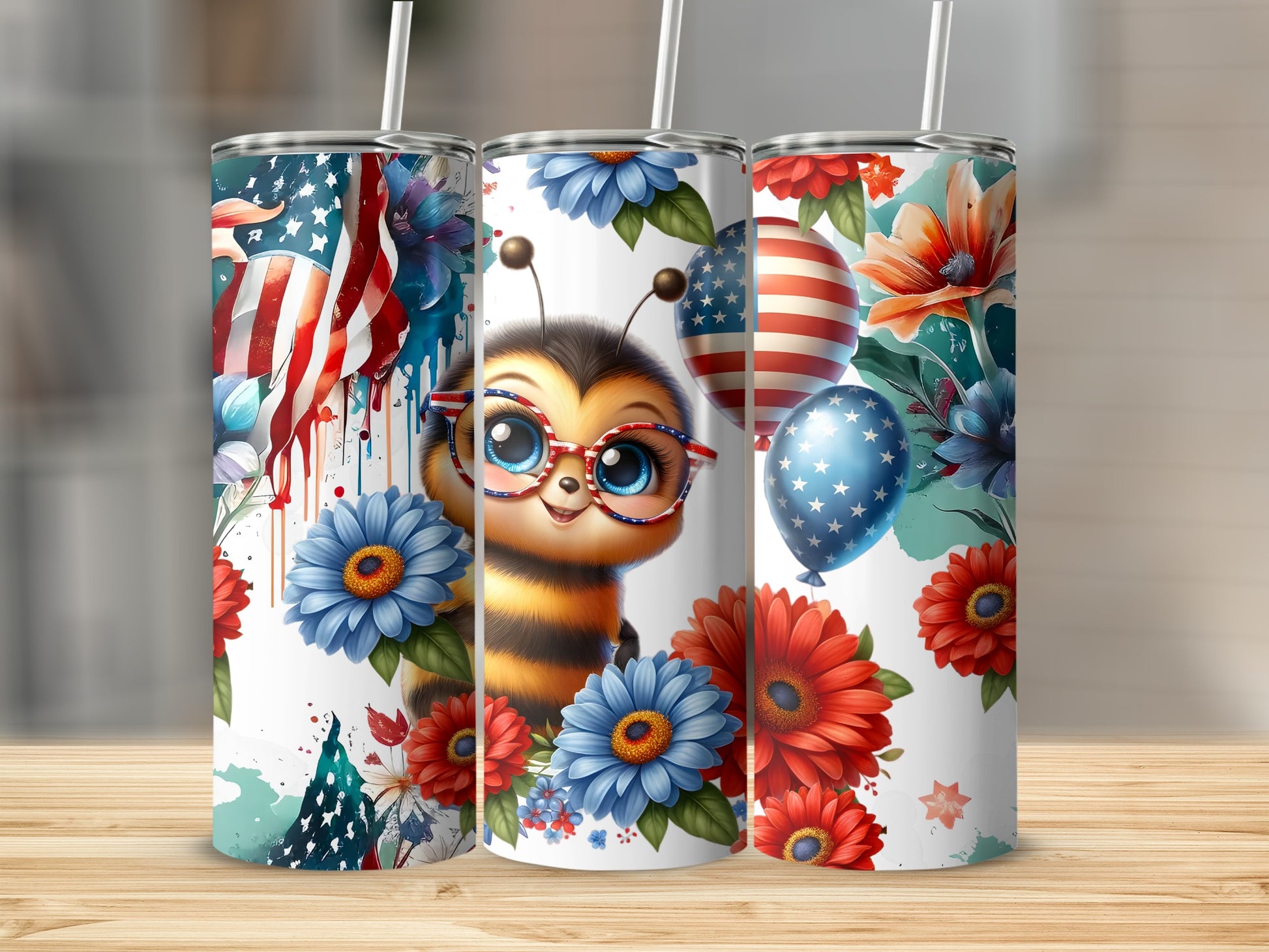 Three tumblers decorated with bees, US flags, and patriotic flowers.
