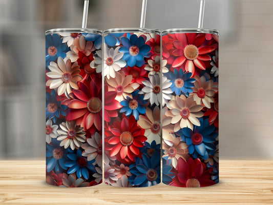 Three tumblers with patriotic floral patterns on a wooden surface.