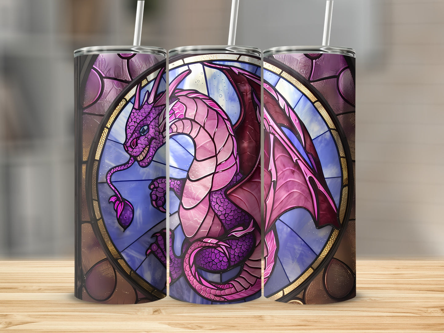 Three tumblers featuring a pink dragon within a stained-glass window design.