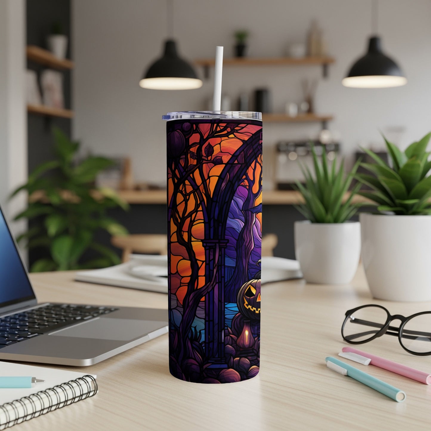 Halloween tumbler with pumpkin, spooky archway, and dark forest design.