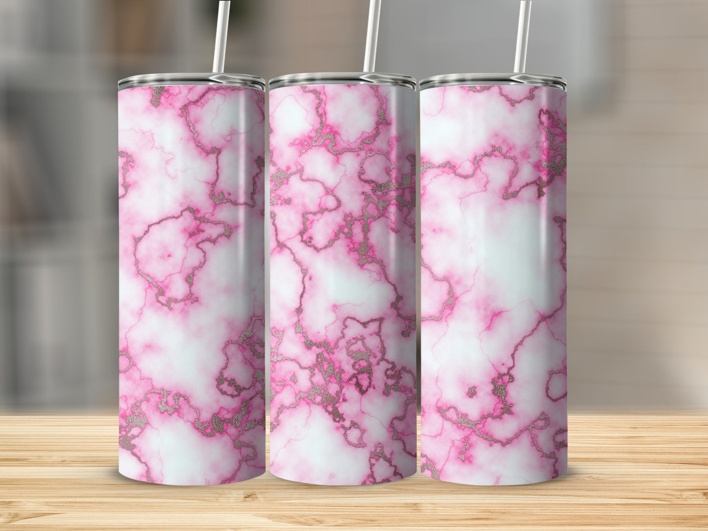Three tumblers with pink marble design and silver glitter accents.