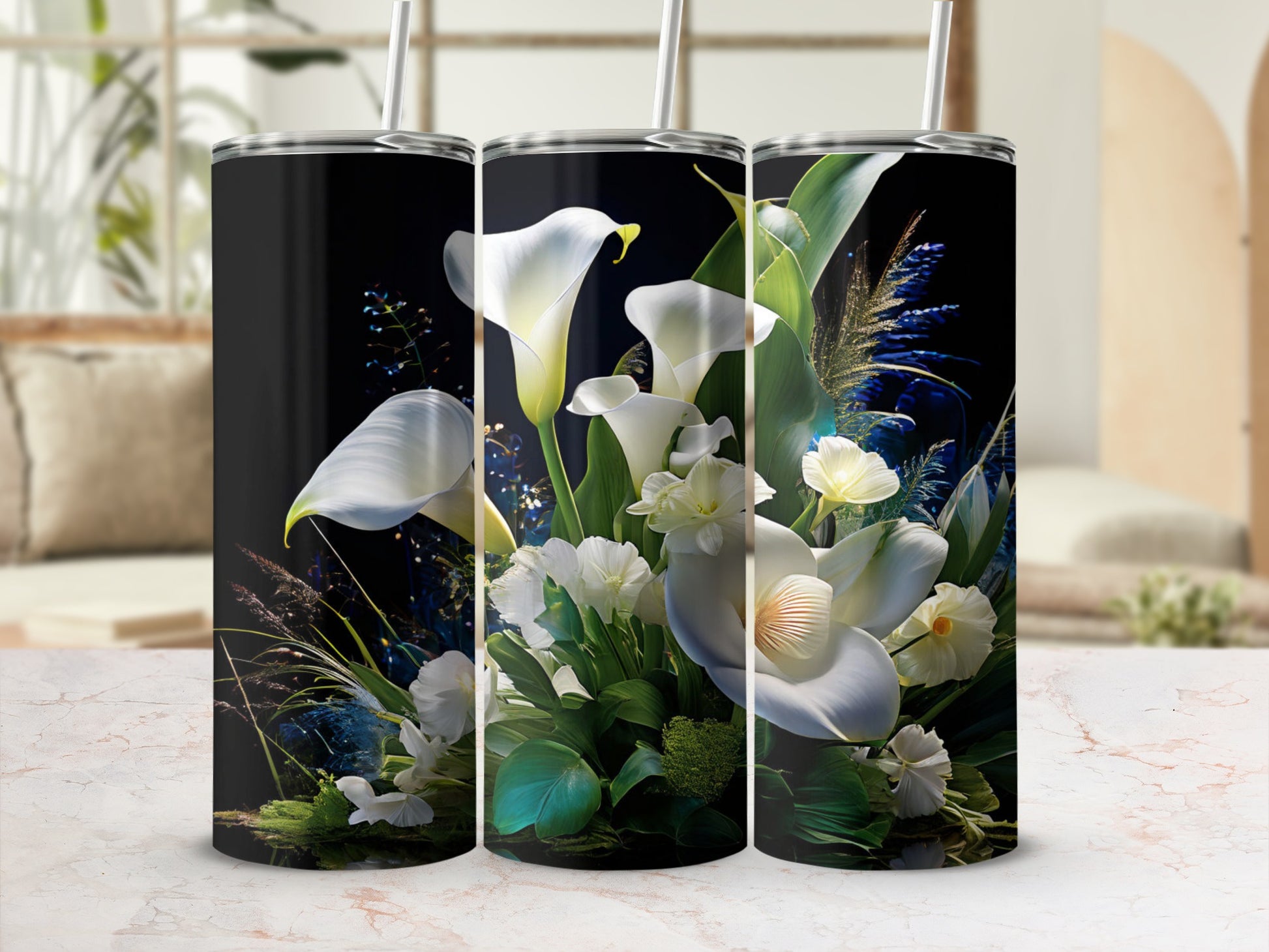 Three tall tumblers with a white floral and green leaf design.