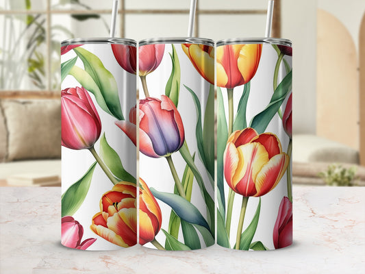 Three tumblers featuring a pattern of red and yellow tulips with green leaves.