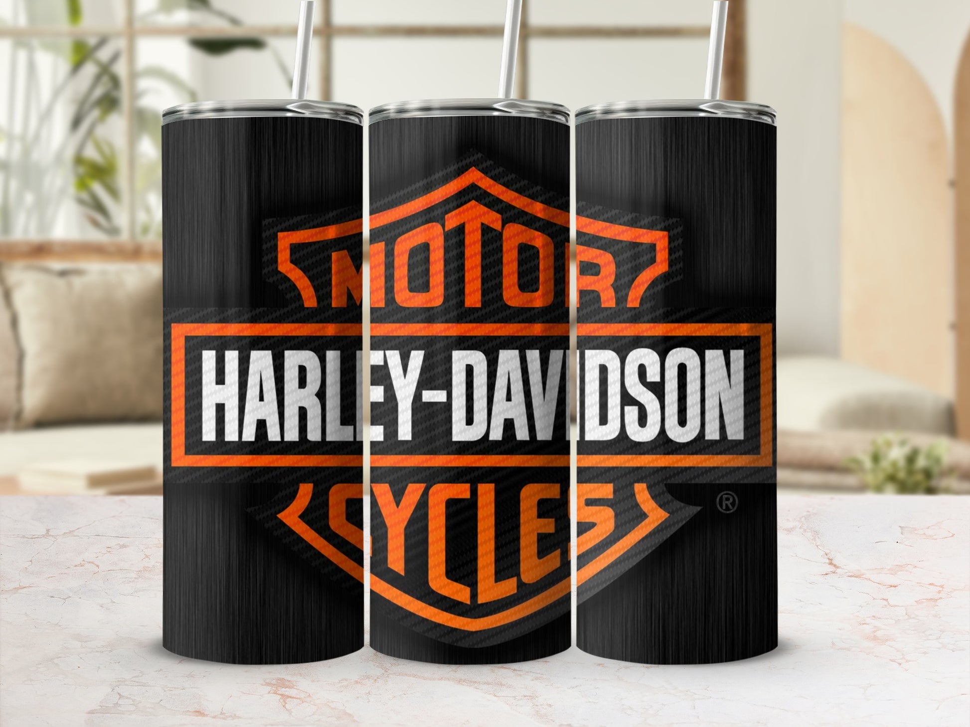 Three tumblers with the Harley-Davidson Cycles logo on a black carbon fiber design