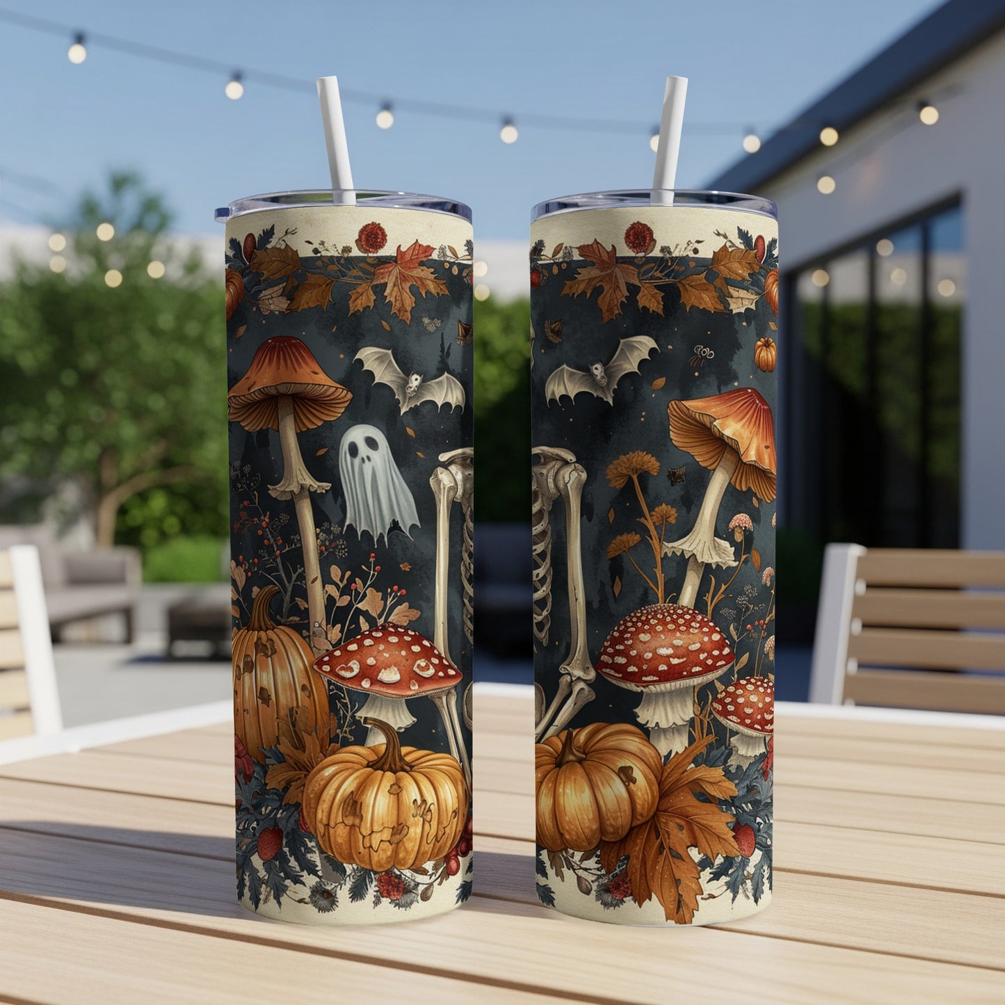 Halloween tumblers with pumpkins, ghosts, bats, skeletons, mushrooms, and autumn leaves.