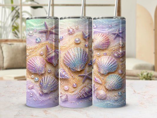 Seashells, starfish, and pearls adorn pastel beach-themed tumbler.