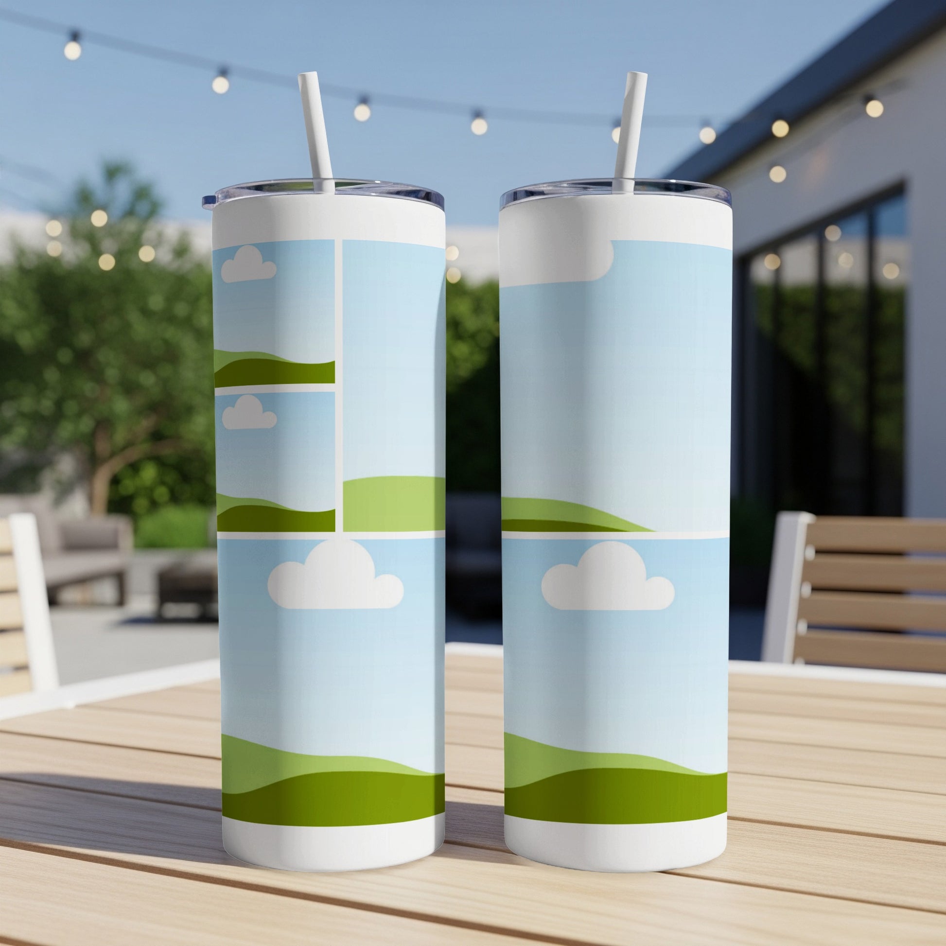 Two white tumblers with a pastel sky and rolling green hills pattern.