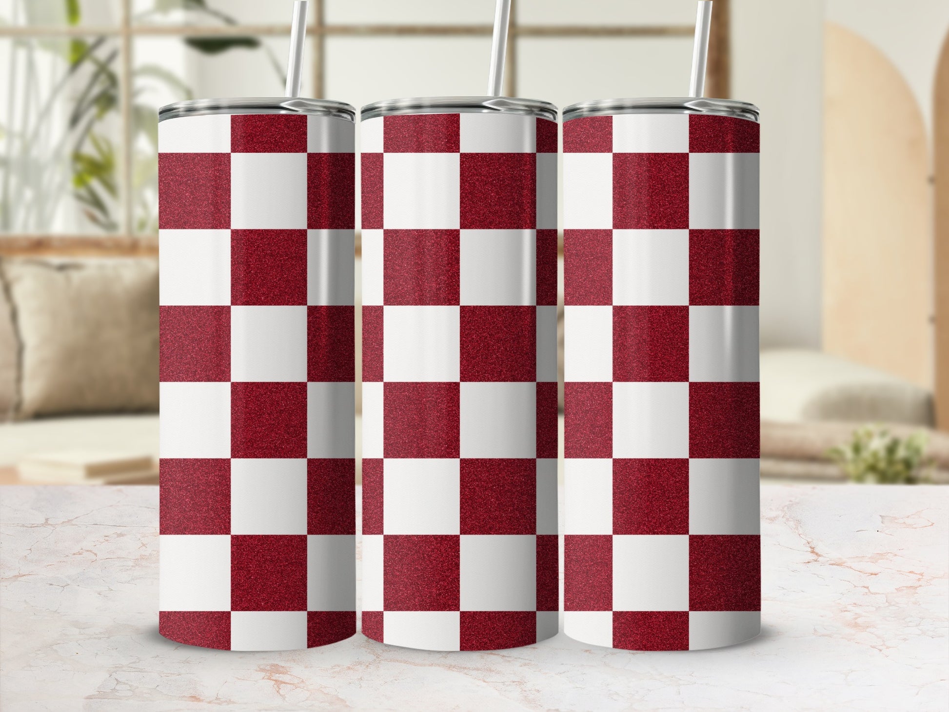 Three tall tumblers with a red and white checkerboard pattern and glitter finish.