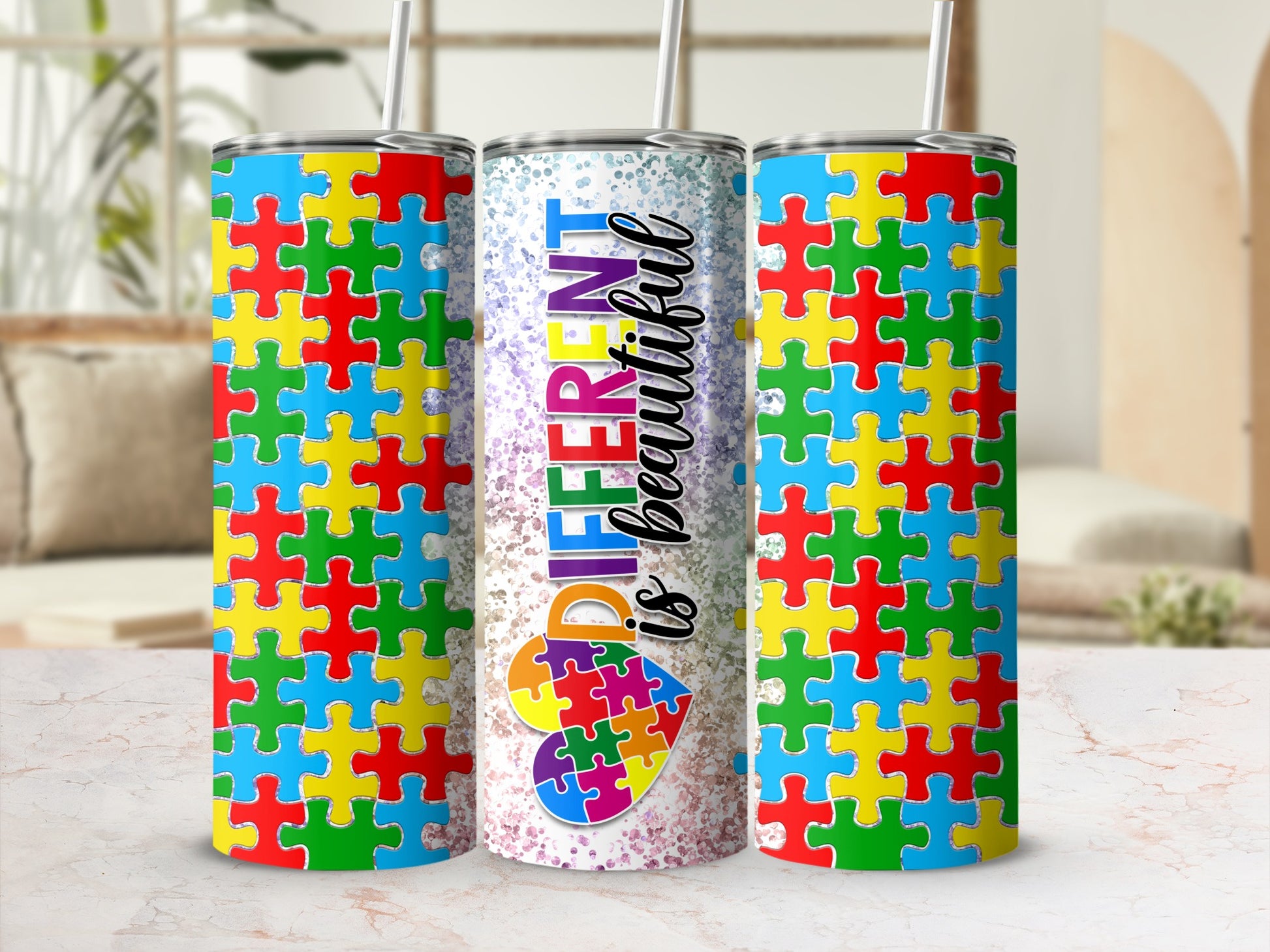 Tumbler with colorful puzzle pieces and text "DIFFERENT is BEAUTIFUL".