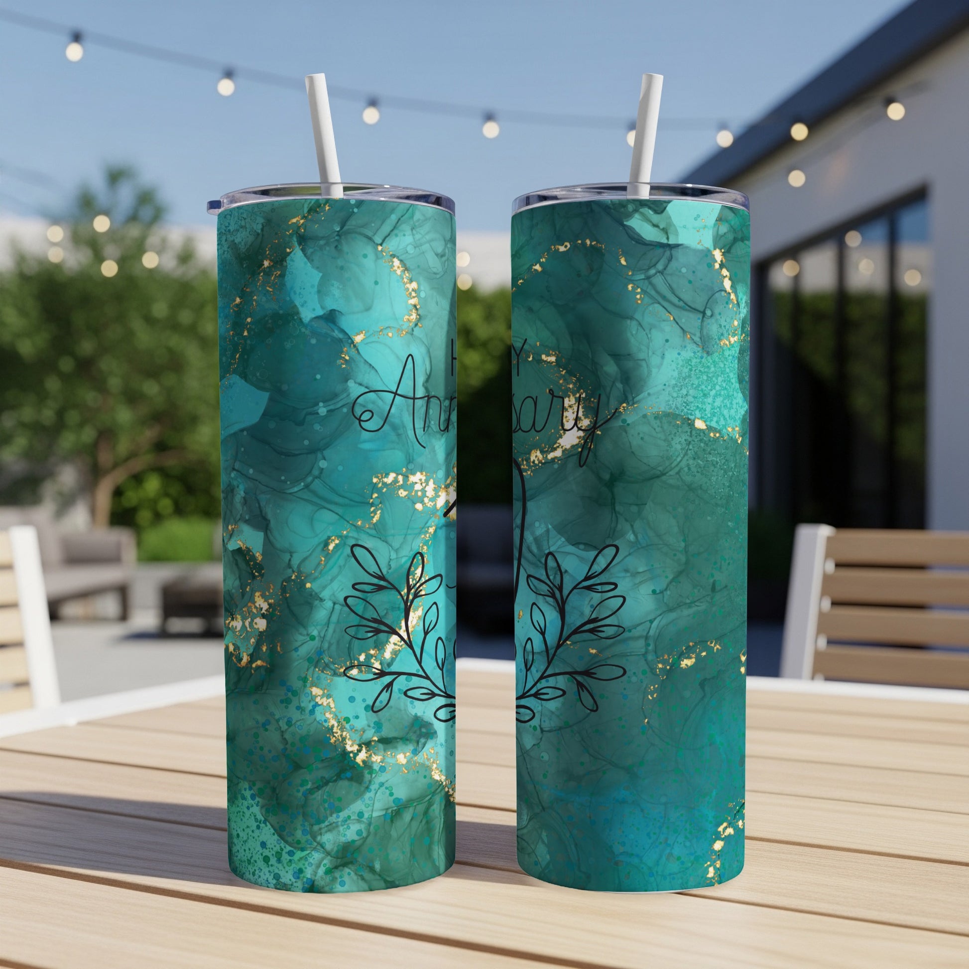 Two teal marbled tumblers with gold accents and "Happy Anniversary" text.