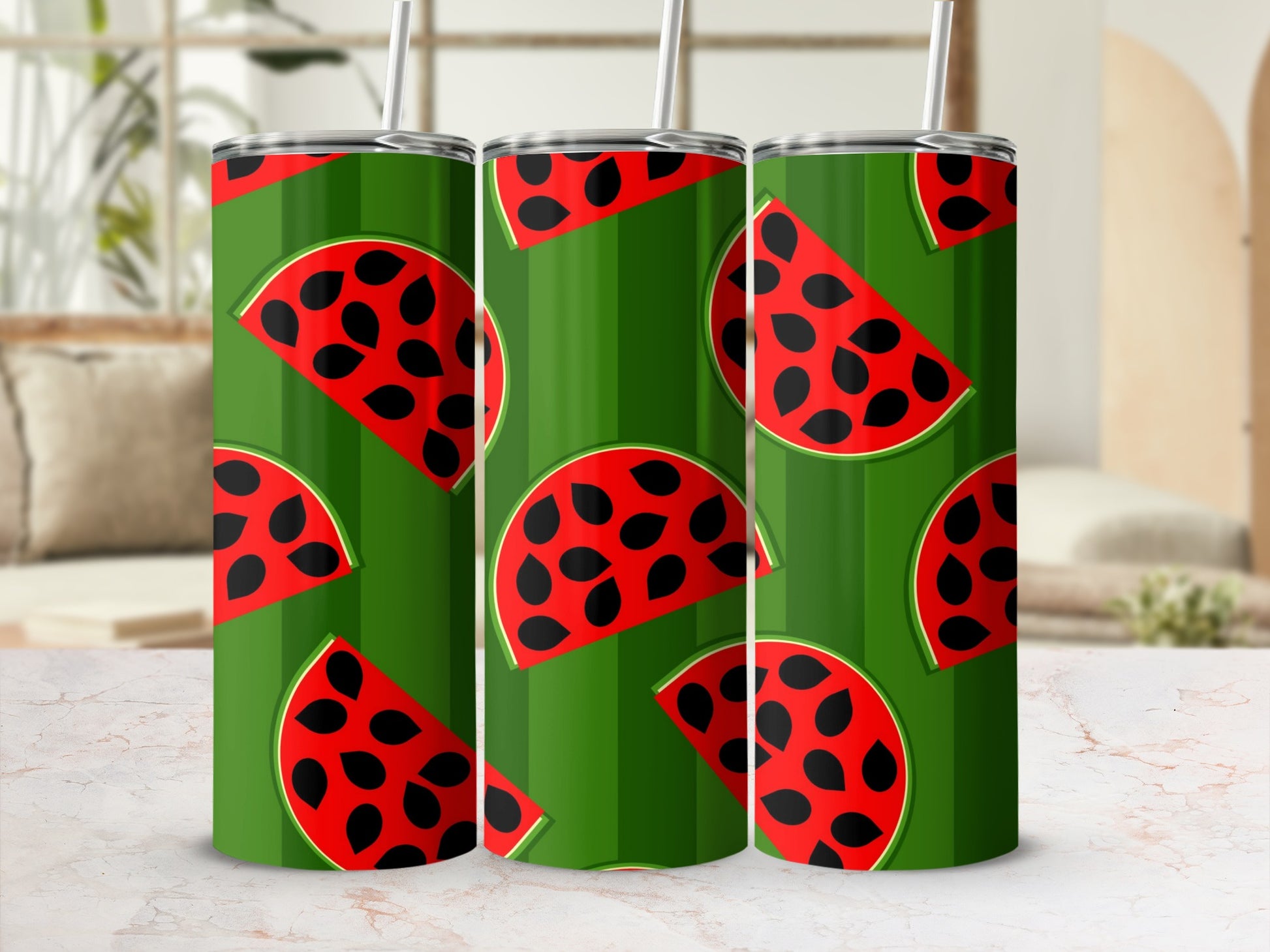 Three tumblers with a repeating watermelon slice pattern on a green striped background.