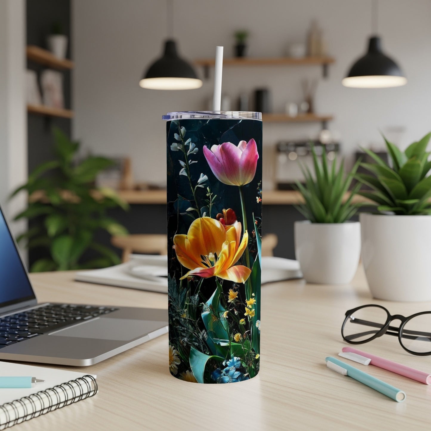 Tall tumbler featuring bright yellow and pink tulips with dark foliage.