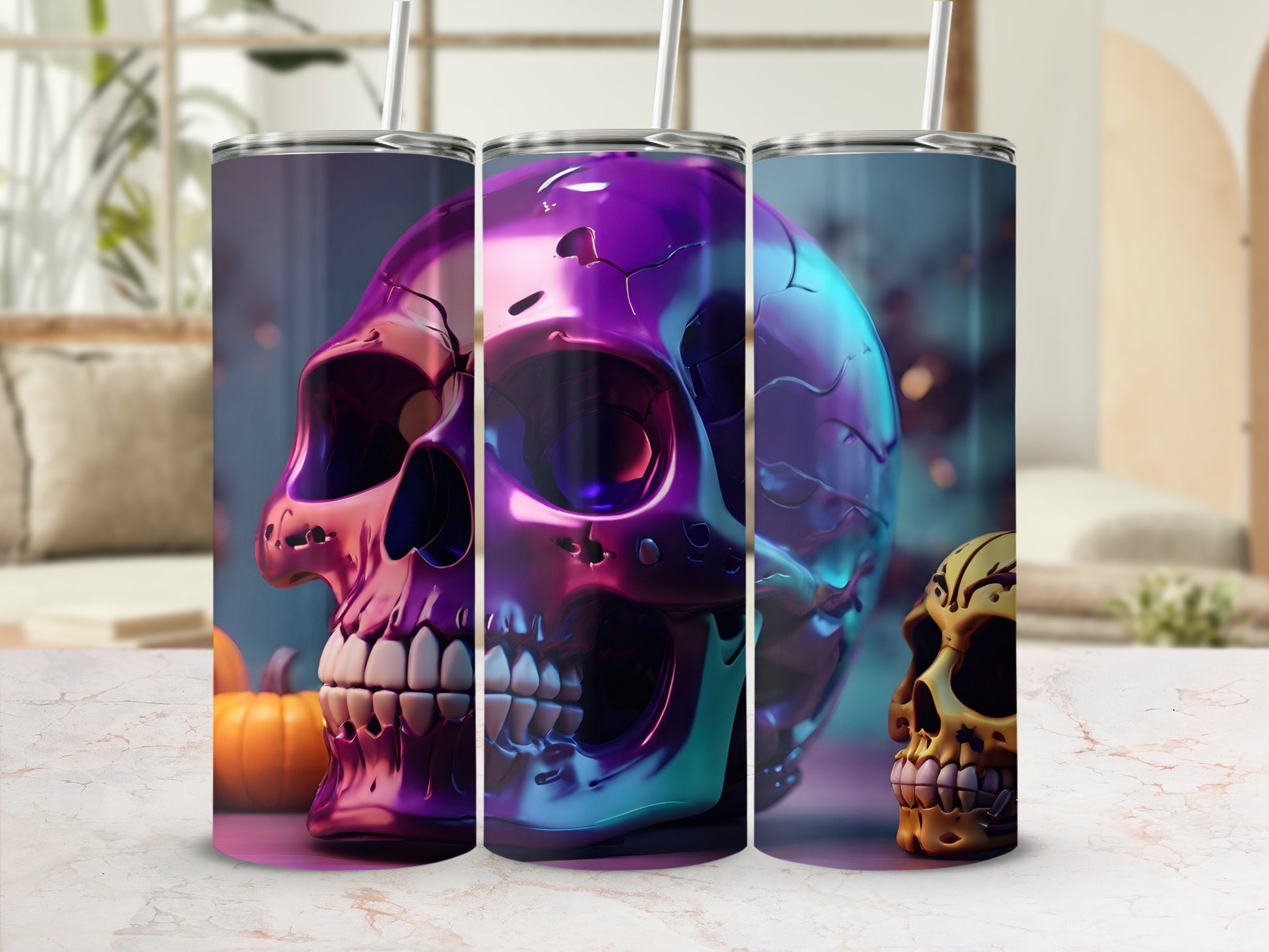 Metallic purple and orange skull designs on two tumblers with a blurred background.
