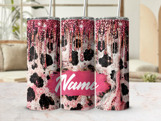 Three tumblers with pink glitter drips and cow print pattern.