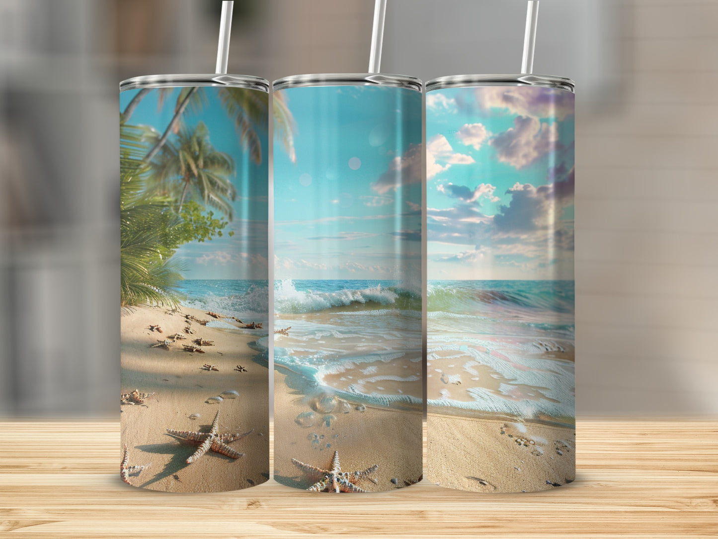 Three tumblers display a beach scene with palm trees, waves, and starfish.