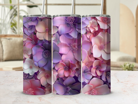 Three tumblers with a vibrant floral pattern of purple and pink blossoms.
